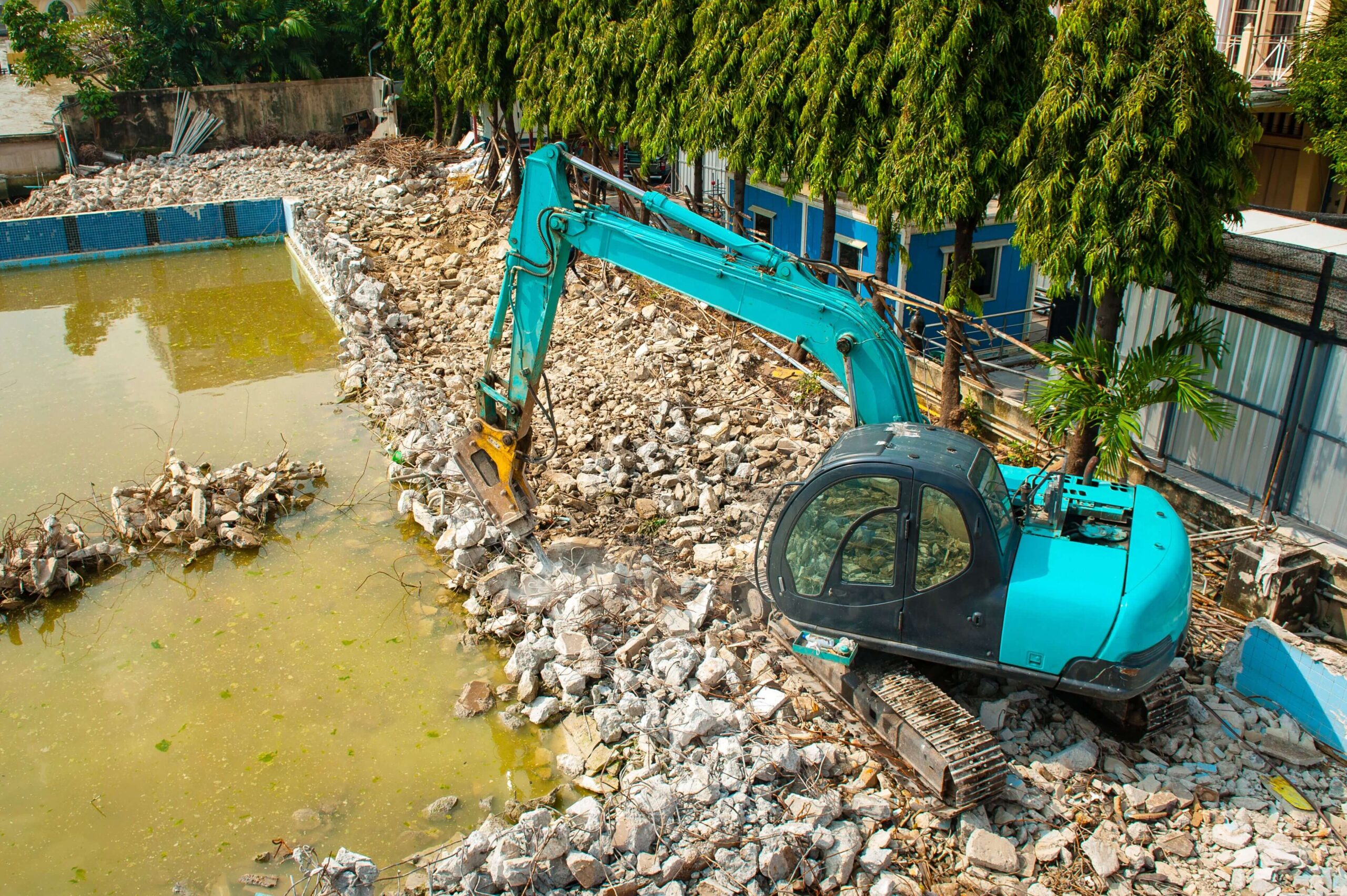 Swimming pool being demolished by
